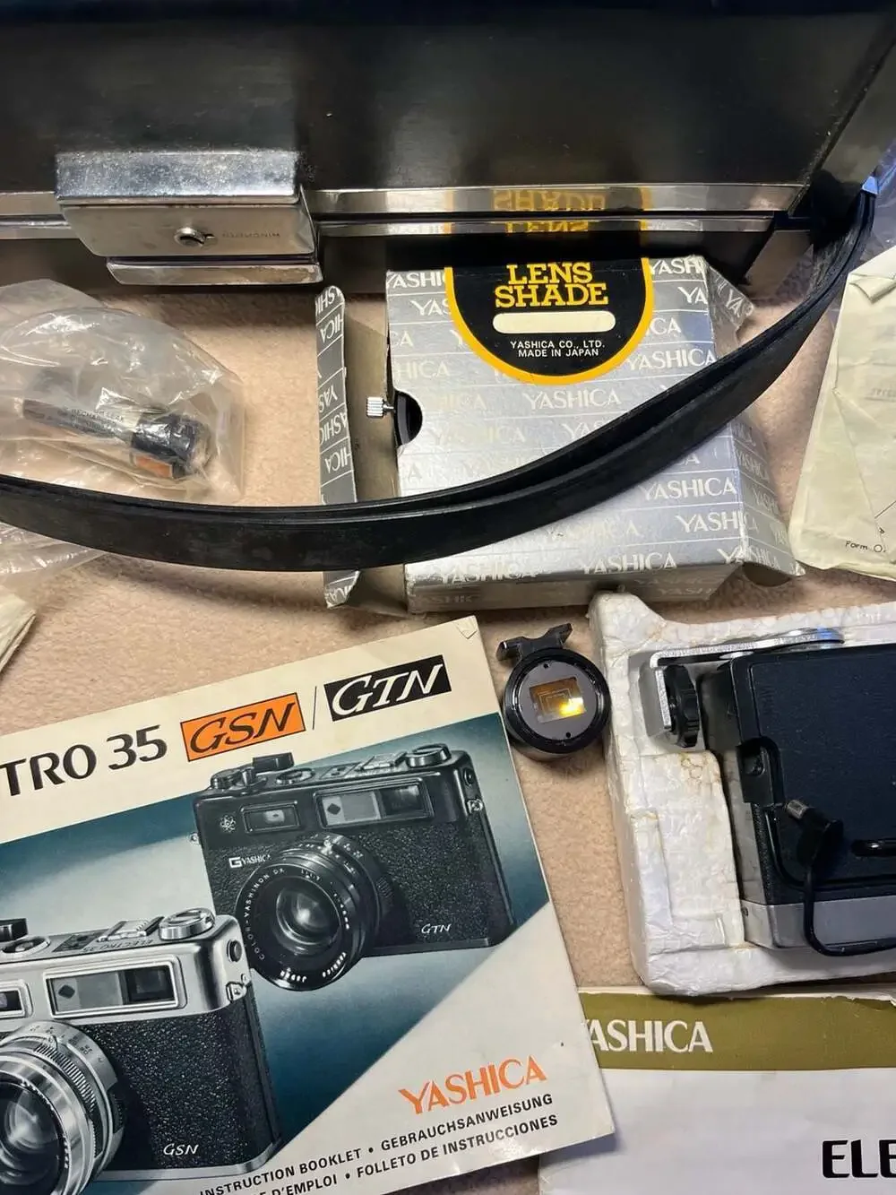 Vintage Yashica Camera Accessory Bundle with Case, Flash, and Manuals